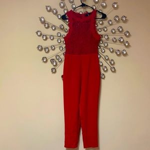 Woman Red jumpsuit! Perfect for the office.